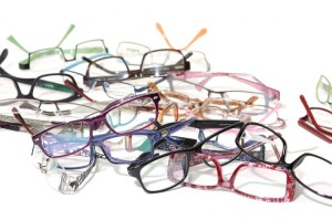 many pairs of colorful glasses